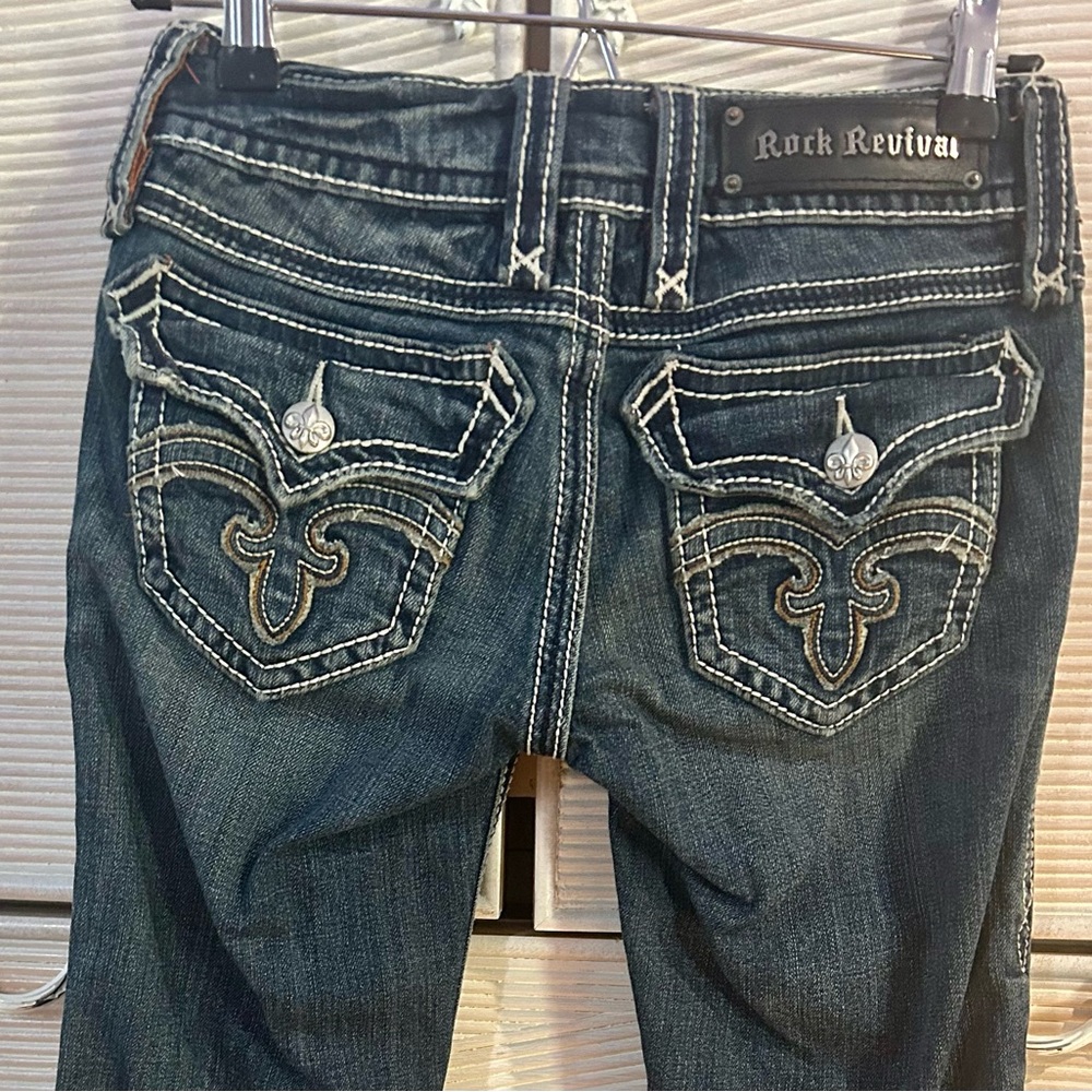 Rock Revival Fleur-de-lis white stitched jeans